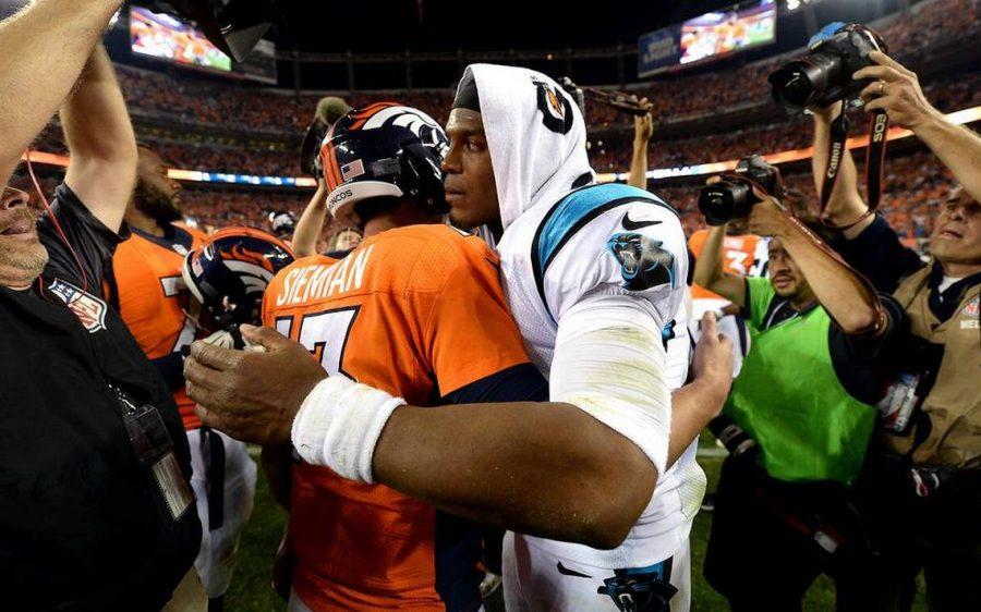 Cam Newton congratulates Trevor Siemian as the Panthers lose to the Broncos 21-20 Week 1