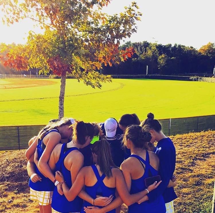 Lady Devildogs huddle before playing matches