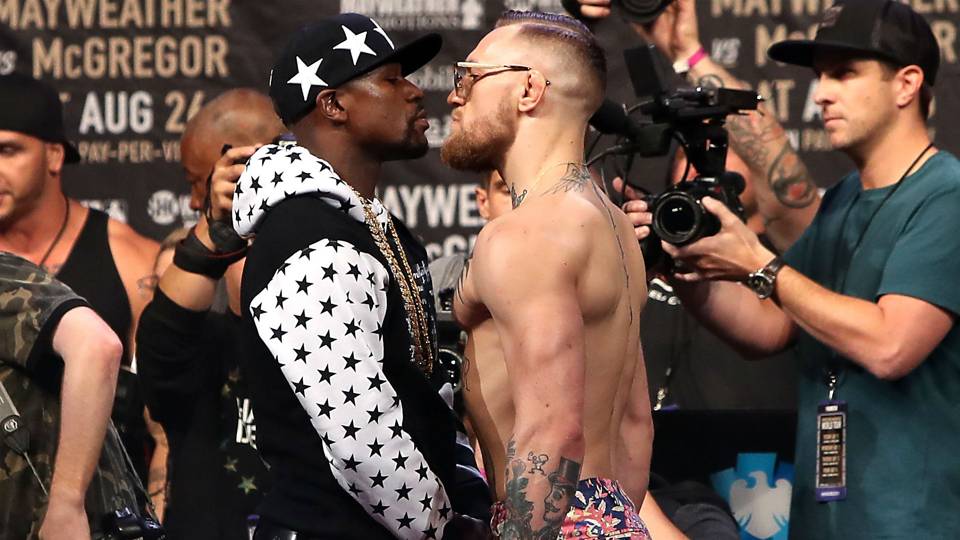 Mayweather, left, and McGregor, right, at NYC press conference