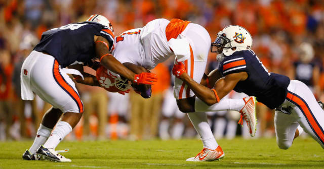 Two+players+from+Auburn+University+tackle+Clemson+Universitys+WR%2C+Mike+Williams