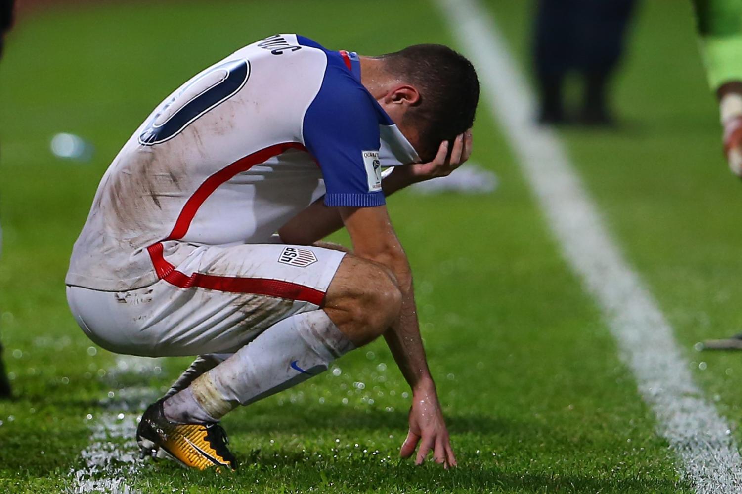 19 year old Christian Pulisic crouching in shame after World Cup aspirations were crushed