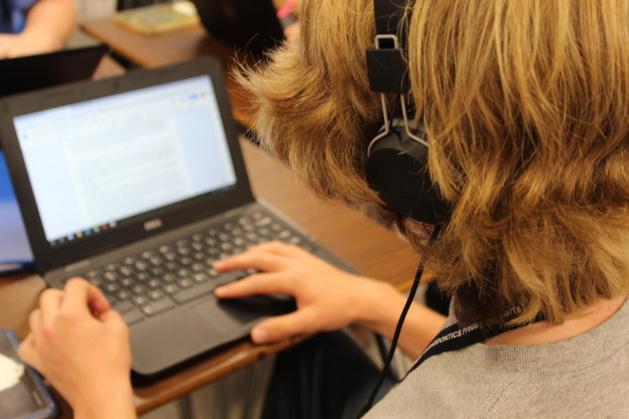 student using his personalized Chromebook for his studies.