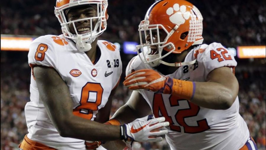 Justyn Ross and DT Christian Wilkins celebrate Ross' touchdown. Ross had six receptions for 153 yards and a score.