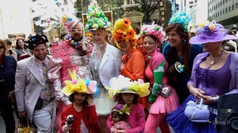 Friends showing off their handmade bonnets at the annual Easter Bonnet Parade